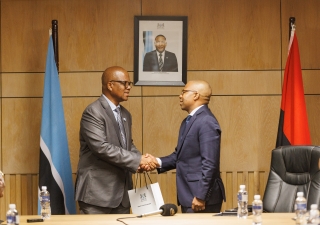 Minister for State Presidency, Defence and Security, Moeti Mohwasa and His Excellency Sandro de Oliveira, Ambassador of Angola to Botswana